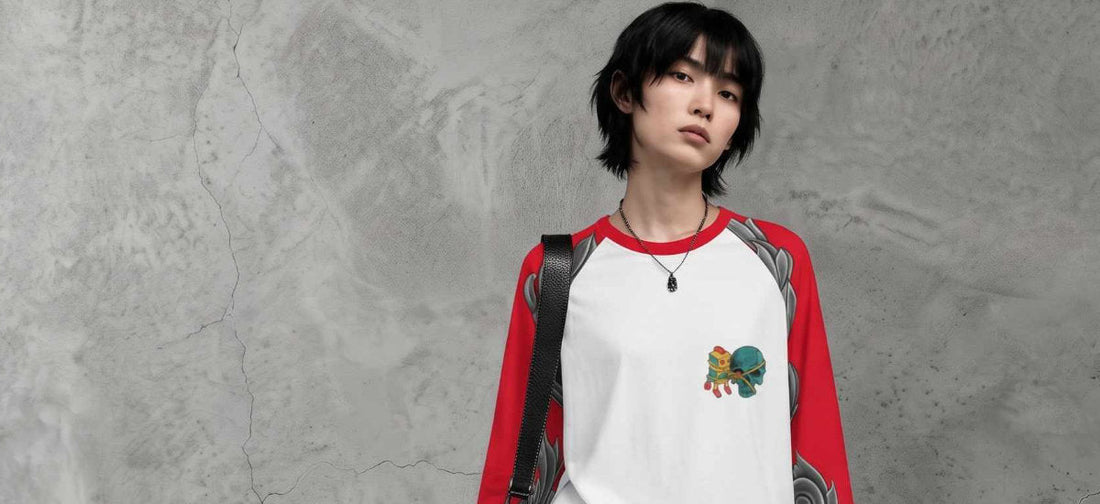 Person wearing a white and red Humandroid raglan T-shirt against a concrete wall