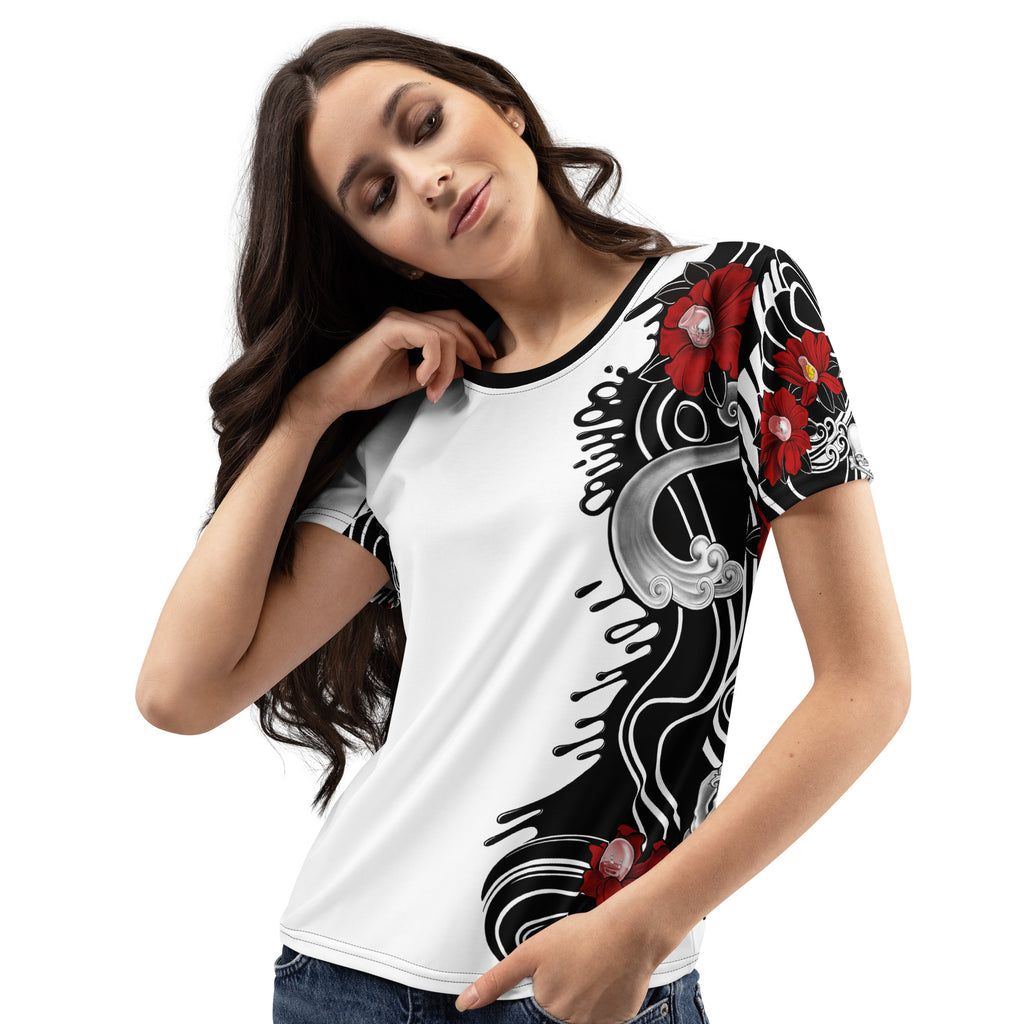A woman modeling a white short-sleeve raglan t-shirt with a black, red, and gray graphic print on the right side, set against a plain white background.