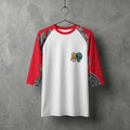 White and red three-quarter sleeve raglan shirt featuring the HumaNDRoid artwork with a small colorful robot graphic on the chest and metallic mechanical details on the sleeves.