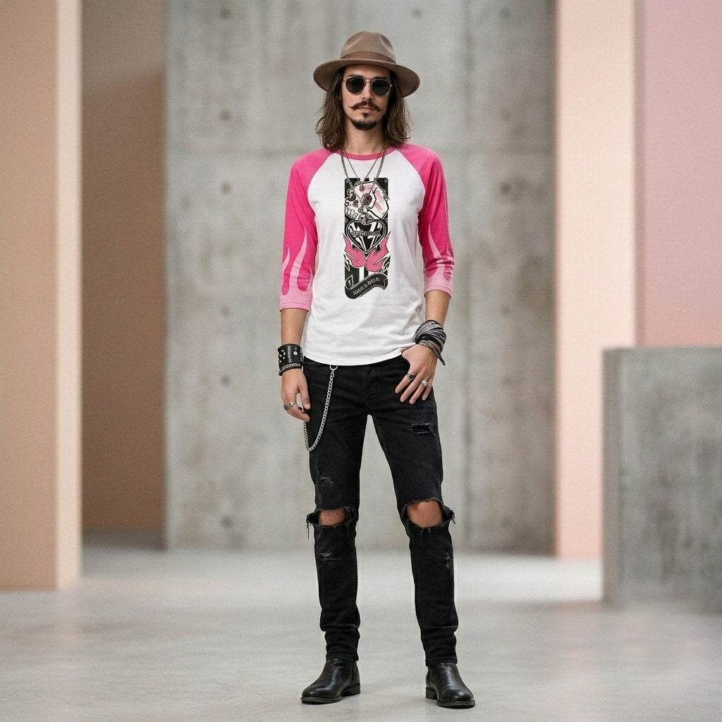 Man wearing a white and pink three-quarter sleeve raglan shirt featuring the Love N Rock graphic with a mechanical skull, pink lettering, and black graphic elements.